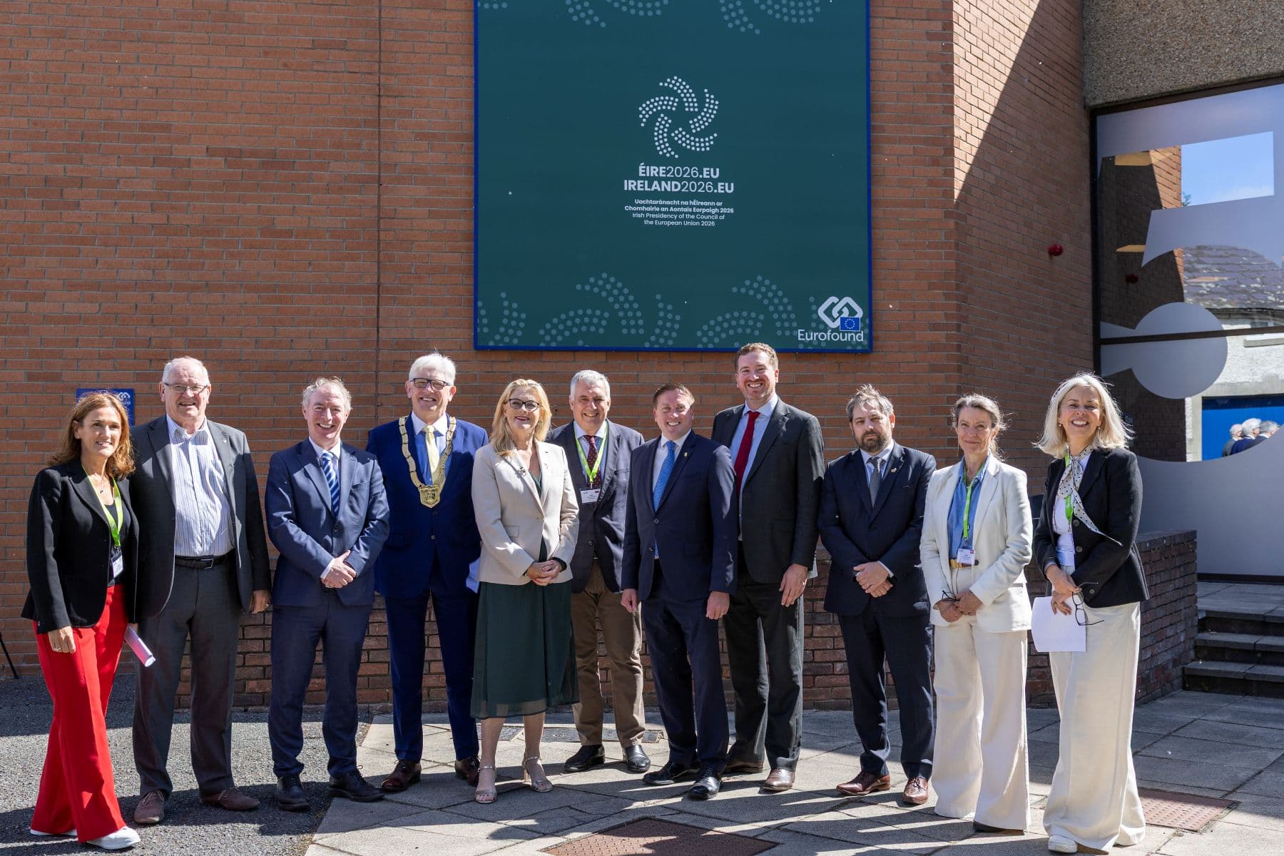 Representatives at the Eurofound Open Day 2026 pose in front of the conference building